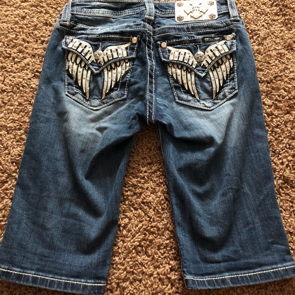 Miss me long shorts (just above the knee).